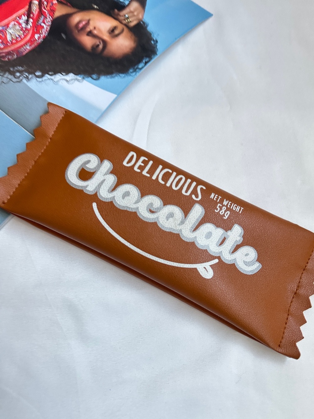 3/25$Brown Chocolate-Themed Cosmetic Case with White Lettering